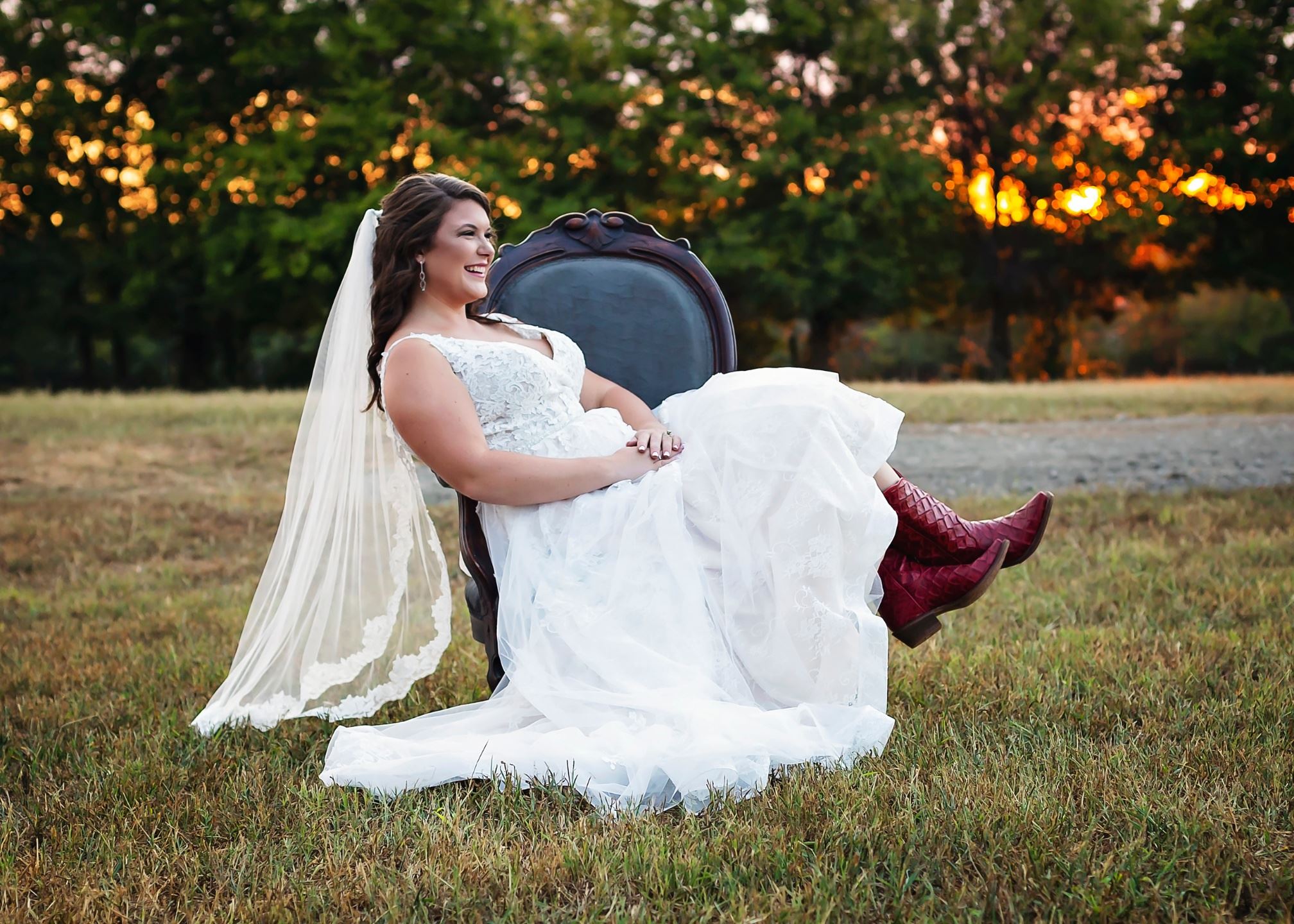cowboy boots with wedding gown red sunset bride